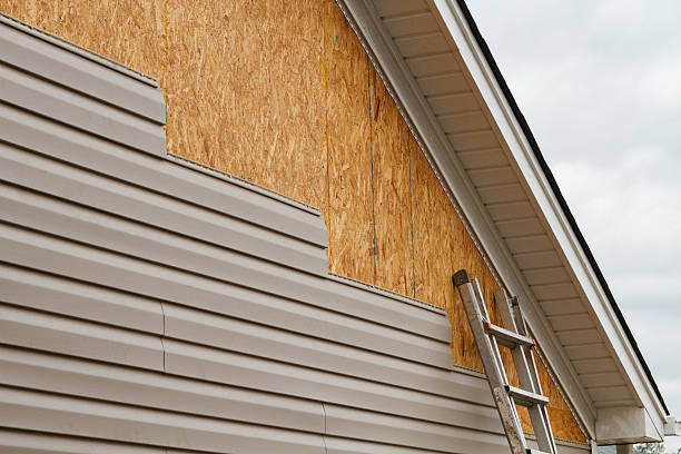 Professional Siding Contractor technician working in Rex, GA